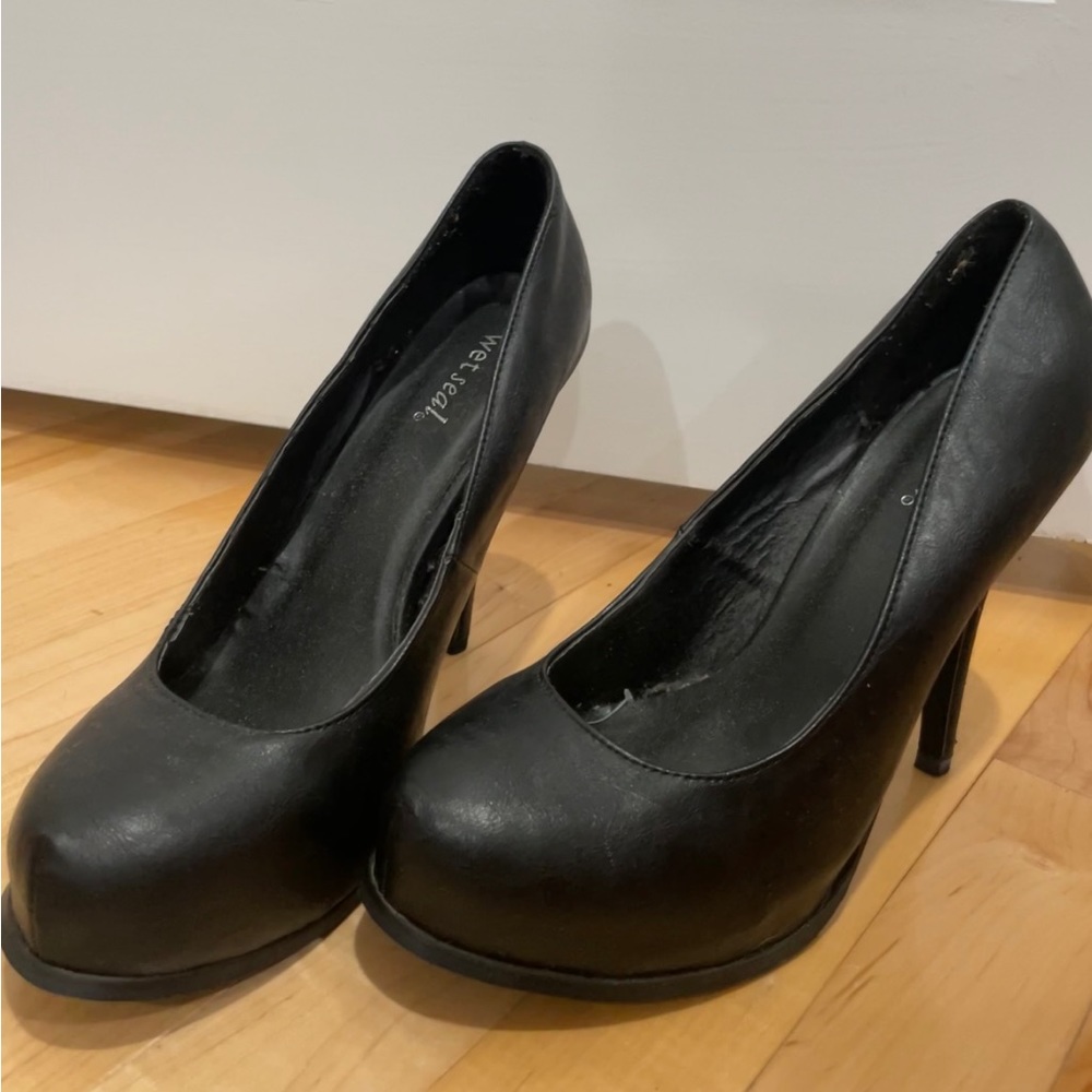 Size 10 black platform heel from Wet Seal